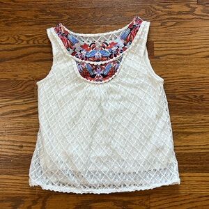 Anthropologie Cream Colored Woven Overlay with Floral Bib Detail Top
